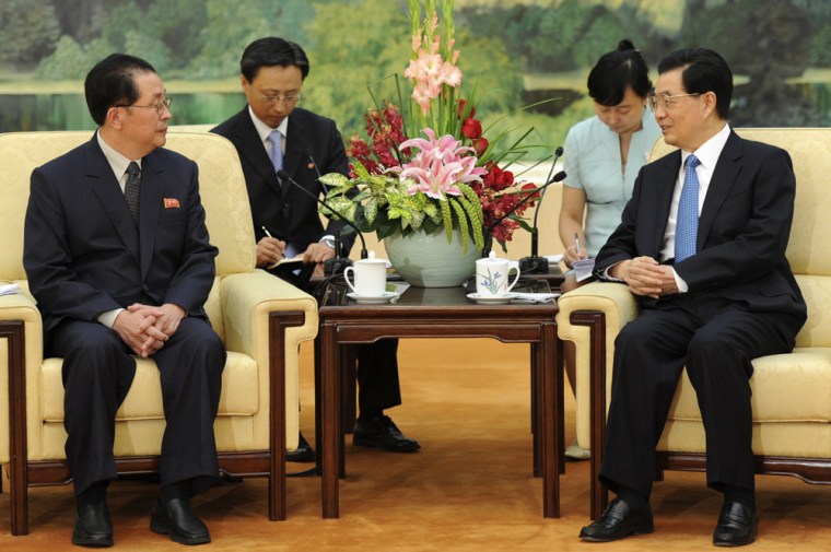 Chinese President Hu Jintao, right, meets with Jang Song Thaek, left, uncle of North Korean leader Kim Jong Un in Beijing Friday, Aug. 17, 2012.