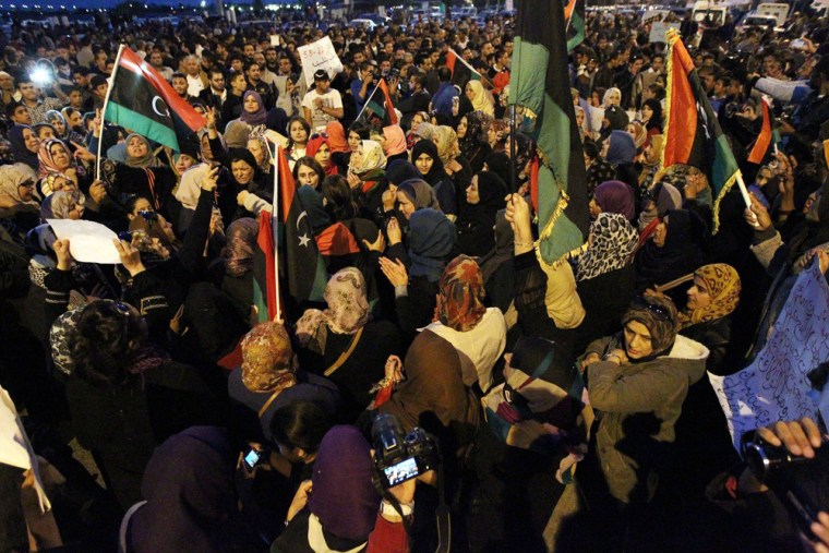 Hundreds of Benghazi residents demonstrate in front of the Tibesti hotel in support of the Libyan Army and Police and against unlawful militia groups on Nov. 29, 2013 in the eastern city of Benghazi, Libya.