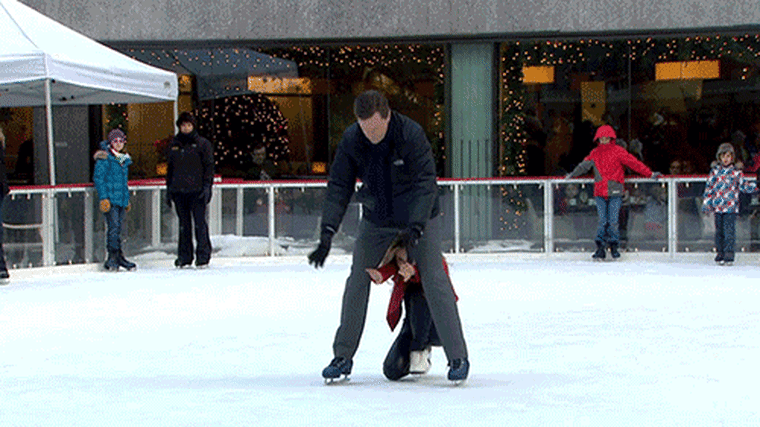 Wille and Tara ice skate together.