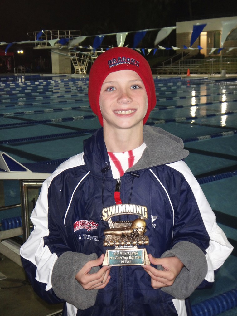 Before the swim meet began, Josh Zuhowski planned on winning five gold medals and the trophy as the top point-getter and giving them to friendly rival Reeze Branzell.