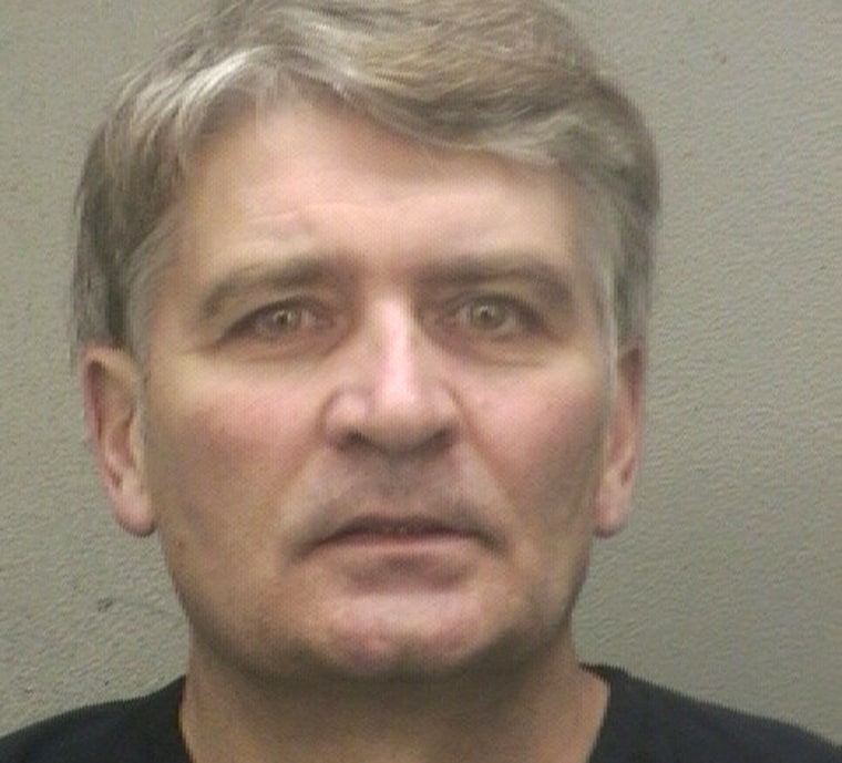 Former UBS banker Raoul Weil is seen in a booking photo after his arrival at the Broward Sheriff's Office in Fort Lauderdale, Fla., on Dec. 13, 2013. A Florida judge ordered Raoul Weil, a former high-ranking UBS banker charged with tax fraud by U.S. authorities, freed on $9 million bond, in federal court Monday in Fort Lauderdale.