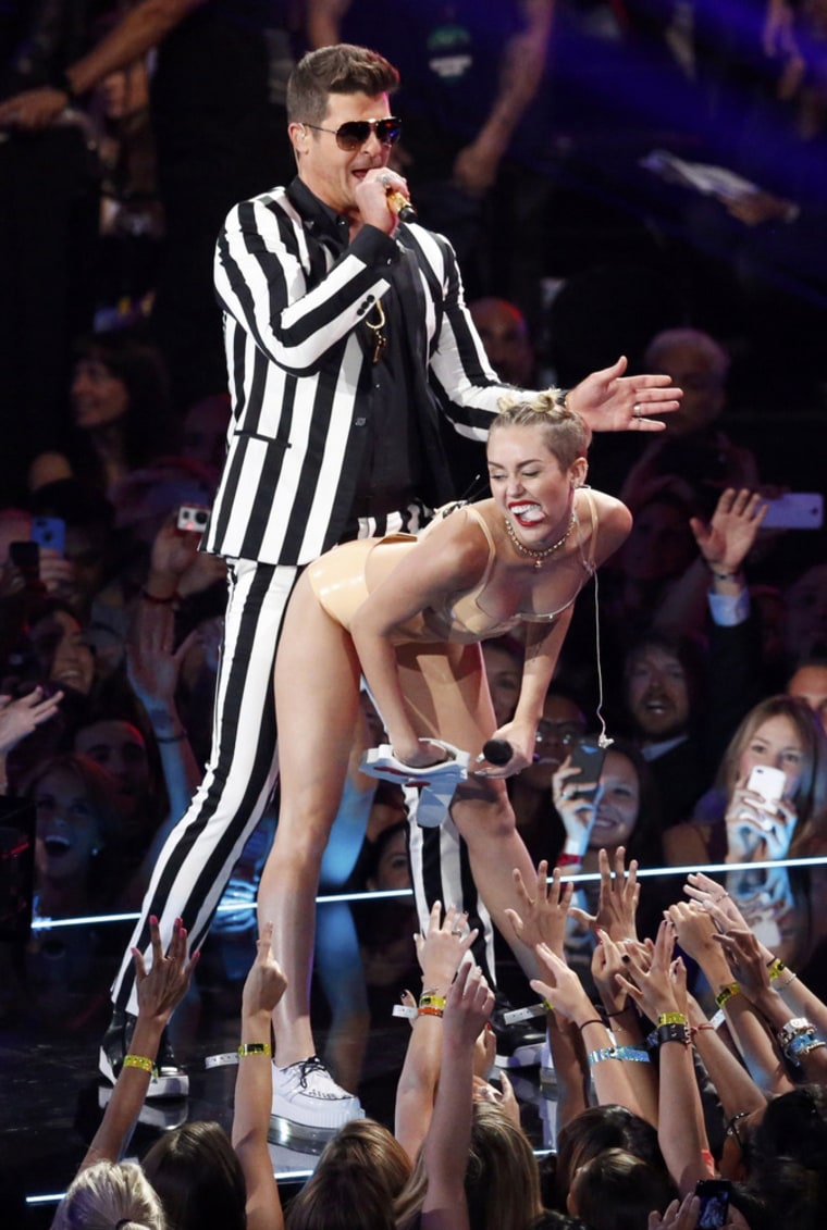 IMAGE: Miley Cyrus and Robin Thicke perform \"Blurred Lines\" during the 2013 MTV Video Music Awards