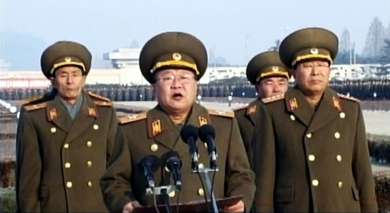 Choe Ryong-hae (center), the director of the General Political Bureau of the North Korean People's Army (KPA), reads a statement during a rally at the plaza of the Kumsusan Palace of the Sun in Pyongyang, North Korea, on Monday.