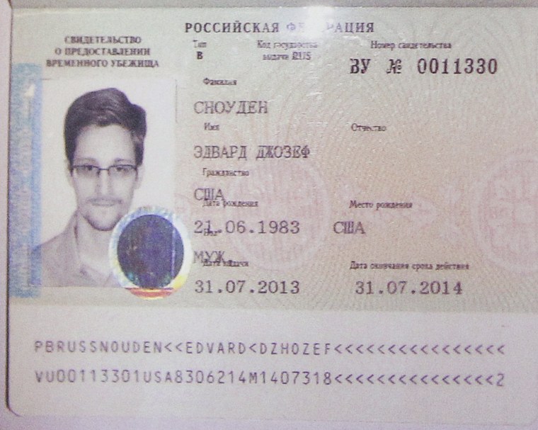 Former U.S. spy agency contractor Edward Snowden's refugee document granted by Russia.