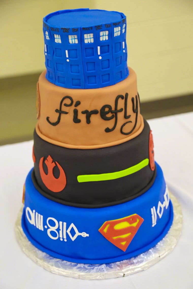 The cake, decked out with details from their favorite pop culture moments.