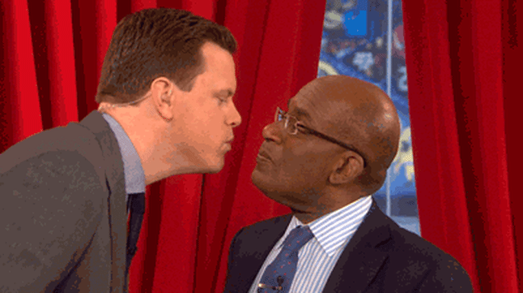 Al Roker and Willie Geist kissing.