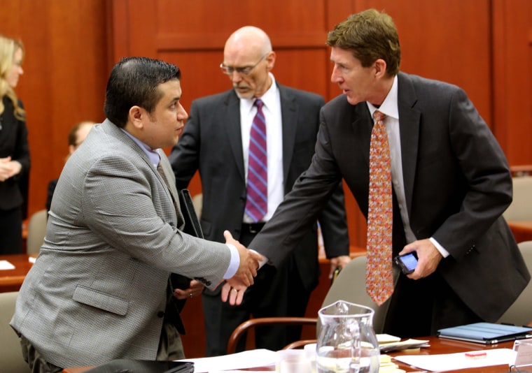 George Zimmerman, left, is greeted by defense attorneys Mark O'Mara, right, and Don West, center, as he arrives in Seminole circuit court on the eighth day of his trial, in Sanford, Fla., in June.