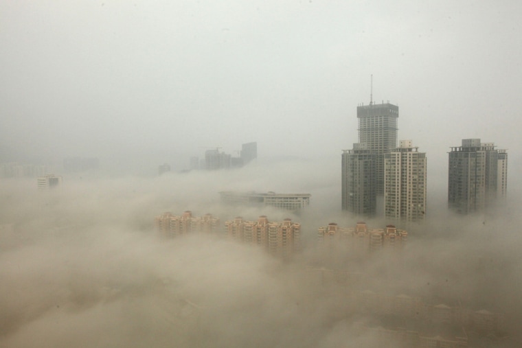 Buildings are shrouded in smog on December 8, 2013 in Lianyungang, China.