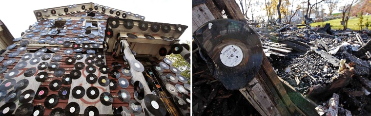 A vacant house covered with hundreds of vinyl LP music albums, known as the House of Soul, is seen near the Heidelberg Project on Sept. 26, 2013. The house was burned to the ground early Nov. 12, 2013, and is being investigated as arson.