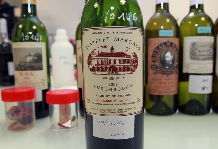 A counterfeit bottle of wine is displayed in a lab run by the French Finance ministry in Bordeaux, southwestern France.