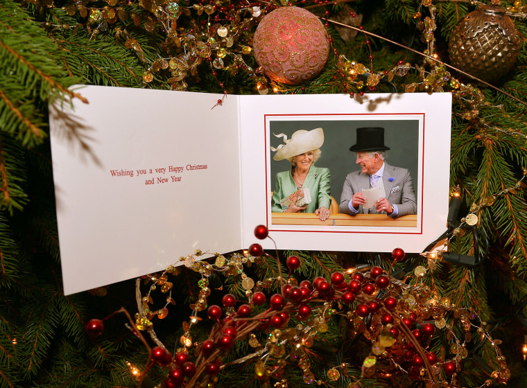 The card reads 'Wishing you a very happy Christmas and New Year.'
The inside of the Prince of Wales and the Duchess of Cornwall's 2013 Christmas card with a photo by Stephen Lo...