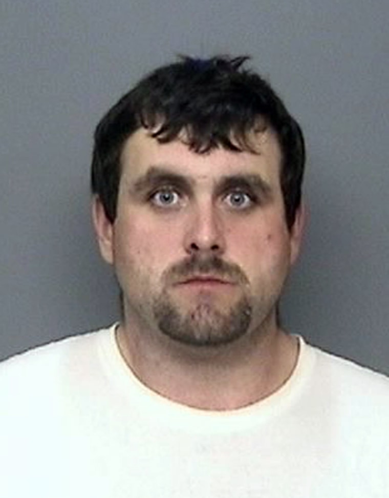 Arrested ex-firefighter Zane Wallace Peterson, 29, seen in a photo taken Tuesday by the Shasta County, Calif., Sheriff's Department.