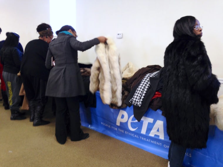 PETA sponsored a charity fur giveaway to donate animal coats and sweaters to the poor in Detroit on Dec. 16.