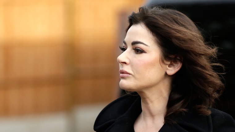 ISLEWORTH, ENGLAND - DECEMBER 05:  Nigella Lawson arrives at Isleworth Crown Court on December 5, 2013 in Isleworth, England. Italian sisters Francesc...