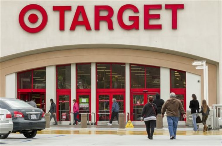 Shoppers arrive at a Target store in Los Angeles on Thursday, Dec. 19, 2013. Target says that about 40 million credit and debit card accounts may have...