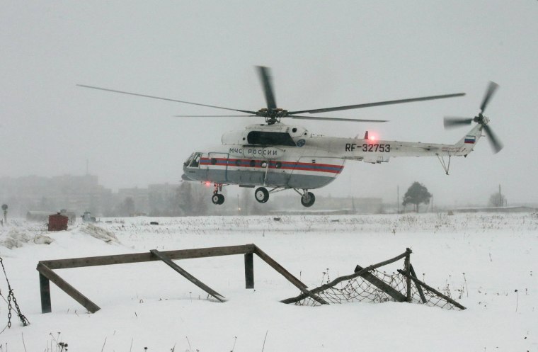 A helicopter takes off from a field next to Penal Colony 7, where Mikhail Khodorkovsky was held in the village of Segezha near Russia's border with Finland on Friday.