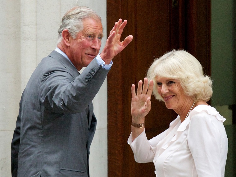 Prince Charles (L) and his wife Camilla, Duchess of Cornwall, arrive at the St Mary's Hospital in London, on July 23, 2013. Britain's Prince William a...