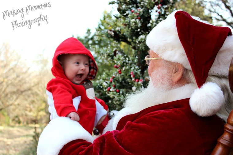 Baby Blake Anthony Allen meets Santa Claus.