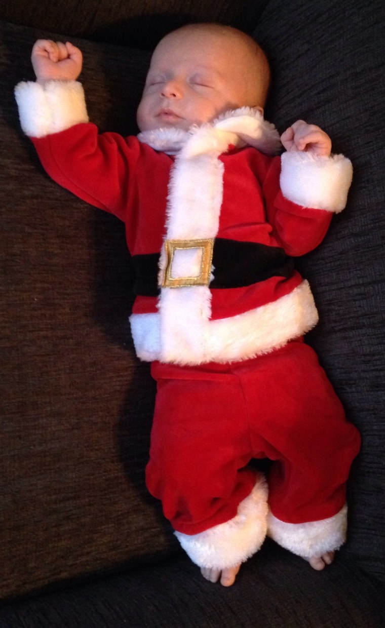 'Santa had a little too much milk,' write the parents of baby Hunter Serlo, decked out in a Santa suit.