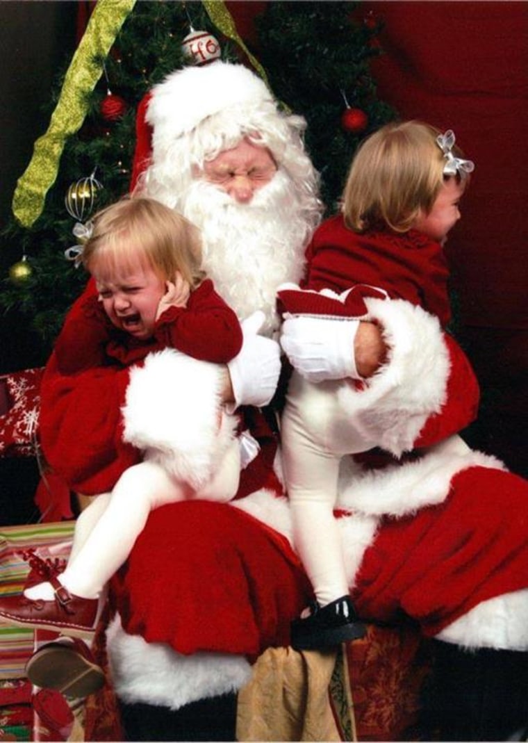 Angela Brown ElliotTODAY Moms
This is a true \"Scared of Santa\" photo but Santa is just as sclared of my twins - one who was swinging punches at him. Allison and Isabel Elliot were 18 months old in this 2011 photo.
