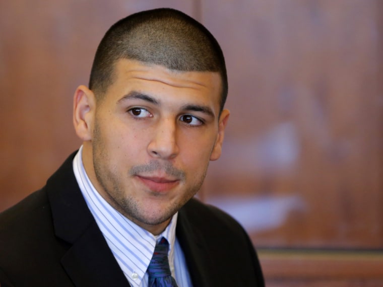 Aaron Hernandez, former player for the NFL's New England Patriots football team, attends a pre-trial hearing at the Bristol County Superior Court in Fall River, Massachusetts October 9, 2013, in connection with the death of semi-pro football player Odin Lloyd in June.