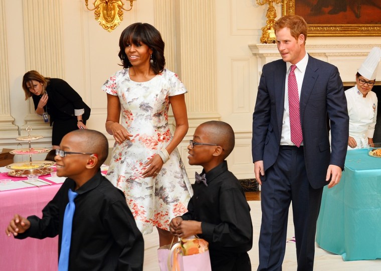 WASHINGTON, DC - MAY 09:  HRH Prince Harry and first lady Michelle Obama prepare to attend an event to honor military families at the White House duri...