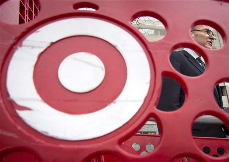 U.S. Sen. Charles Schumer, is pictured through a Target shopping cart,