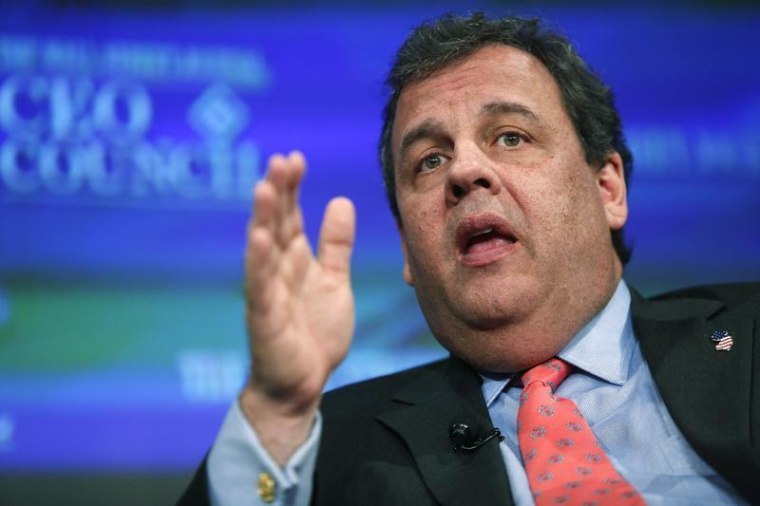New Jersey Governor Chris Christie (R-NJ) participates in an onstage interview during the Wall Street Journal's CEO Council annual meeting in Washington November 18, 2013.