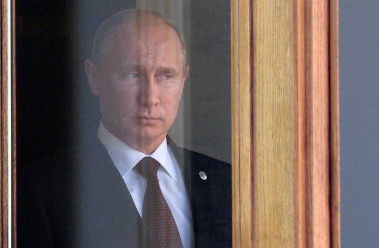 President Vladimir Putin waits for heads of state at the start of the G20 summit on Sept. 5 in St. Petersburg, Russia.