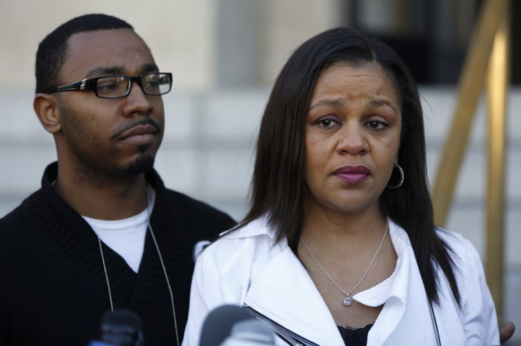 Omari Sealey, left, uncle of 13-year-old Jahi McMath, and Sandra Chatman, grandmother of McMath speak to members of the media after a court hearing in Oakland, Calif., on Dec. 24.