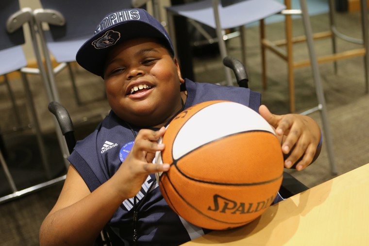 Charvis Brewer, the newest and youngest member of the Memphis Grizzlies, beams with excitement on Sunday.
