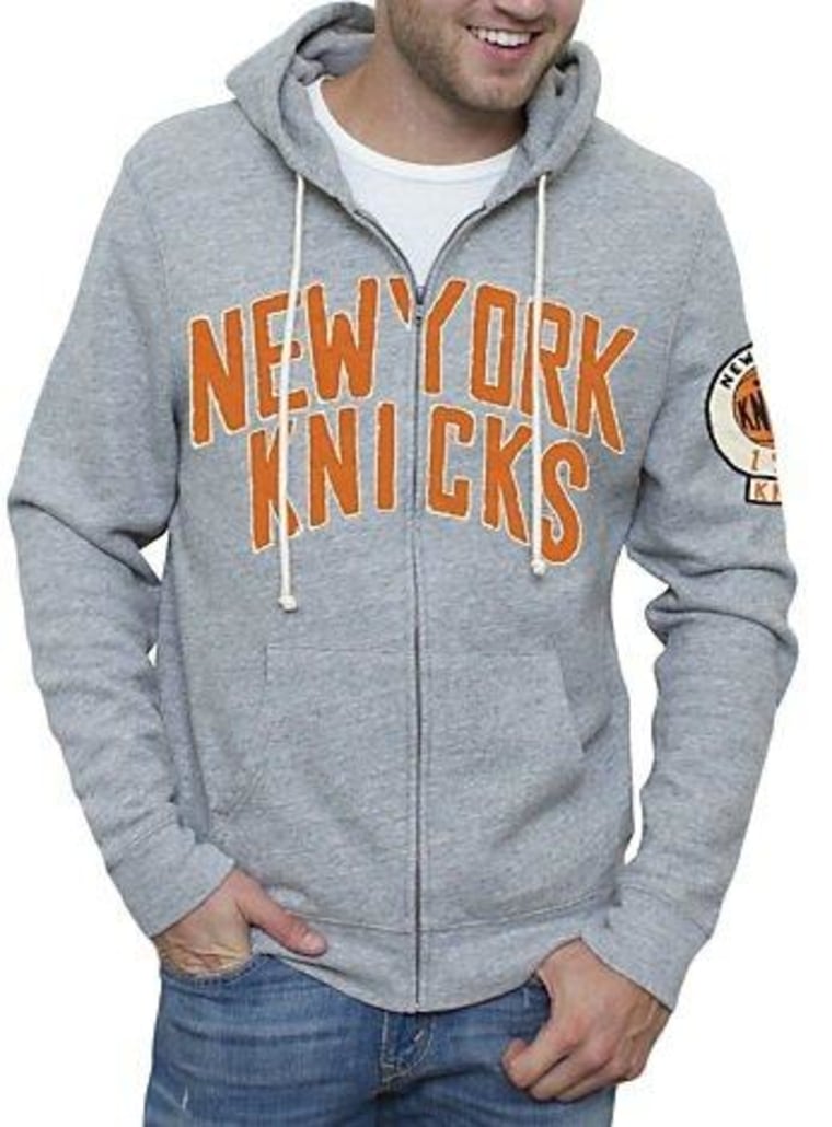 Stay stylish while you support your team in a t-shirt or sweatshirt from Junk Food Clothing.