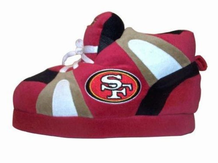 Plan on watching the game from the couch? Slip on a pair of Comfy Feet slippers with your team's logo.