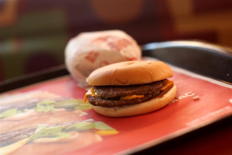 A McDouble burger is pictured at a McDonald's restaurant Wednesday in San Francisco.