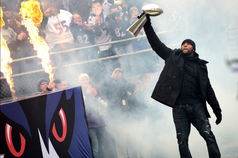 Ravens Linebacker Ray Lewis celebrates with the Vince Lombardi Trophy during the Super Bowl XLVII victory parade at M&T Bank Stadium on Feb. 5, in Baltimore.
