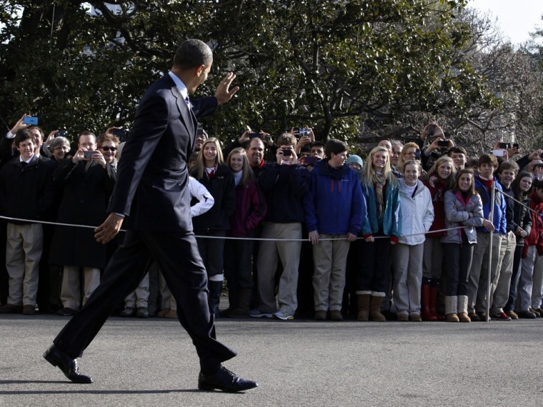 President Barack Obama waves as he walks on the South Lawn of the White House on Feb. 6 before his departure to Annapolis, Md.