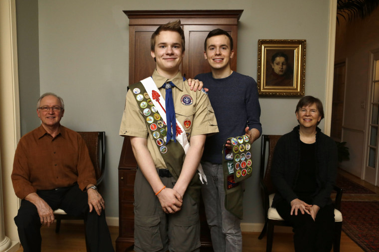 In this Monday, Feb. 4, 2013 photo, Pascal Tessier, 16, center left, a Scout, and his brother Lucien Tessier, 20, who had earned the rank of Eagle Scout, pose for a portrait with their parents, Oliver Tessier, left, and Tracie Felker, at their home in Kensington, Md. The two Tessier boys enjoyed Cub Scouts, progressed to Boy Scouts, and continued to thrive there even as many in their troop became aware that each boy was gay.