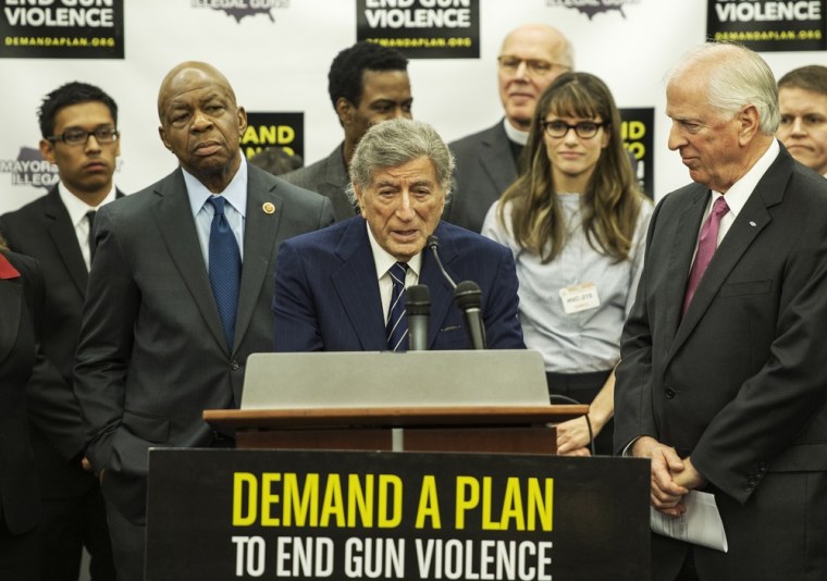 Tony Bennett spoke during a press conference by Mayors Against Illegal Guns on Wednesday in Washington, DC, as representative Elijah Cummings (D-MD), Chris Rock, Rev Timothy A. Boggs (right) and Amanda Peet look on.
