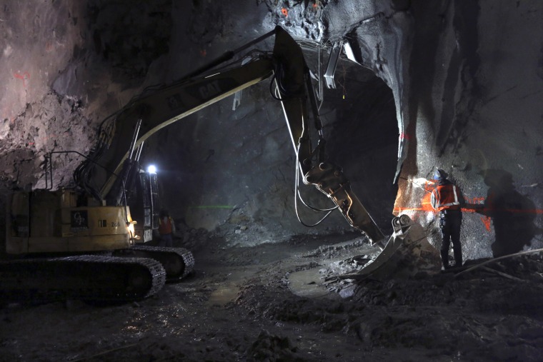 Contractors work on the East Side Access project beneath midtown Manhattan, in New York. The East Side Access is one of three bold projects under New York that will expand what's already the nation's biggest mass-transit system by 2019.