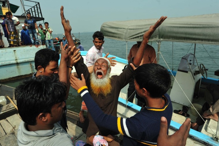 A man mourns the loss of a relative after a ferry accident in Munshiganj, Bangladesh, on Feb. 8, 2013.