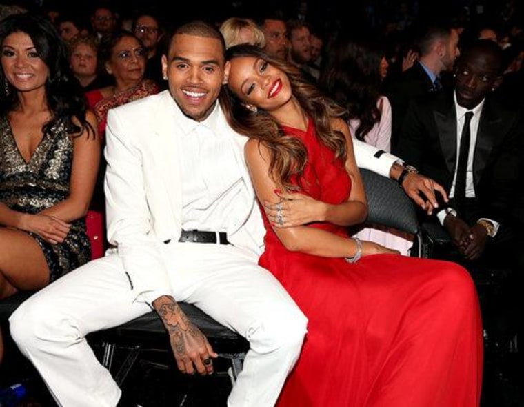 Chris Brown and Rihanna cuddled up at the Grammy's.