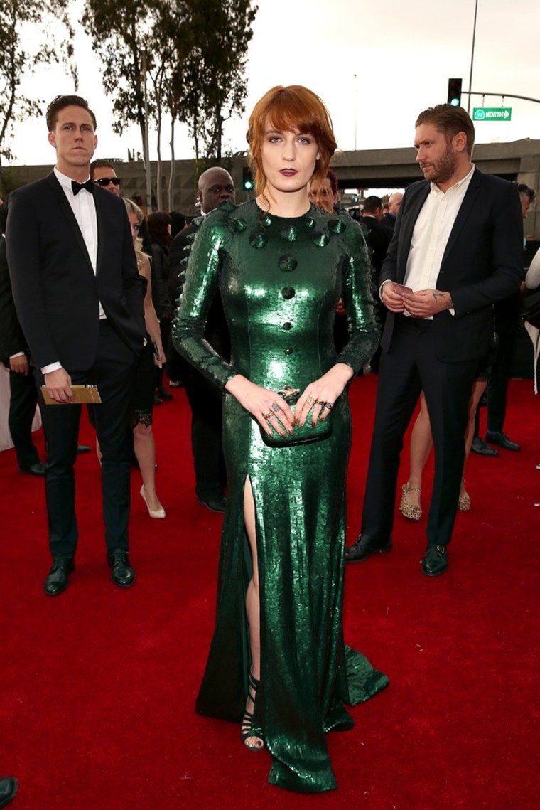 Florence Welch shows no skin from the leg up.