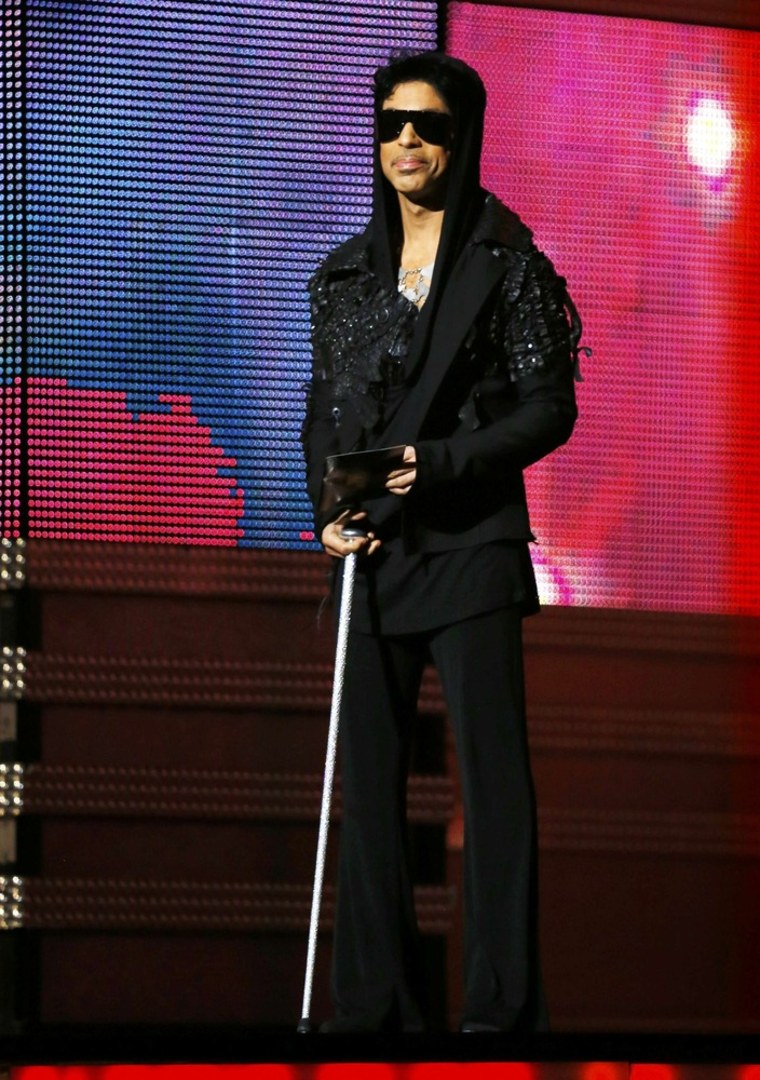 Prince graces the stage stage at the 55th annual Grammy Awards