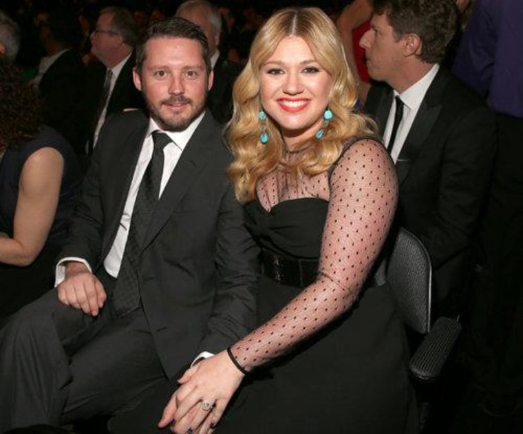 A beaming Kelly Clarkson gave us a glimpse of her engagement ring as she sat with fiance Brandon Blackstock.