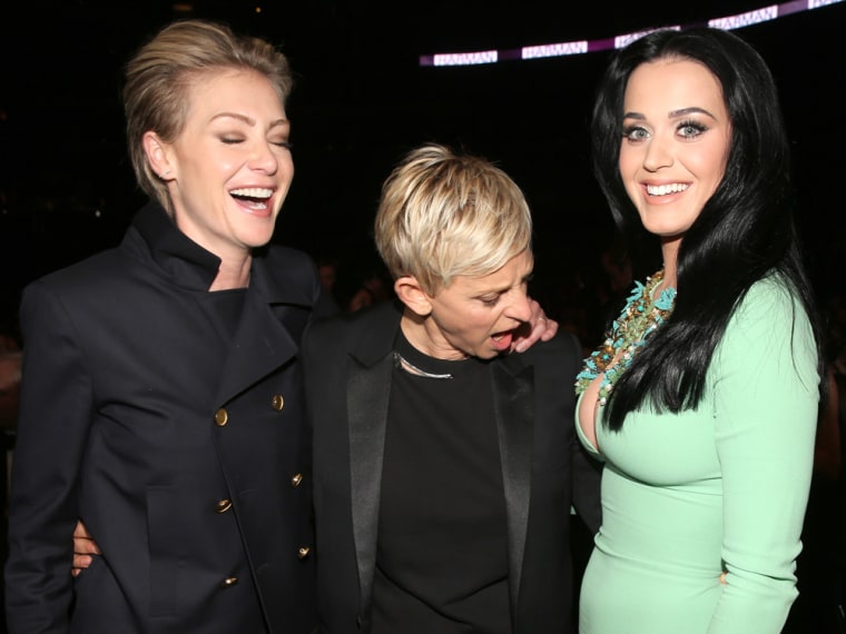 Hello! Portia de Rossi laughs as Ellen DeGeneres checks out Katy Perry's outfit.