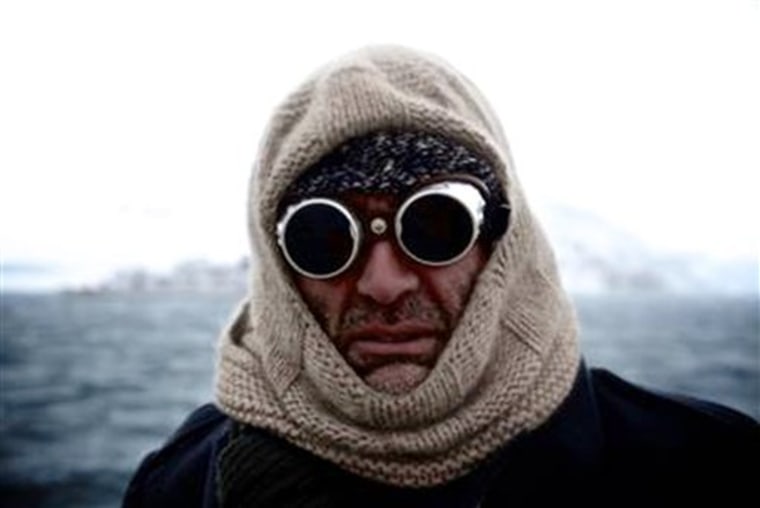 Expedition leader Tim Jarvis poses on the deck of their boat Alexander Shackleton in the Southern Ocean.