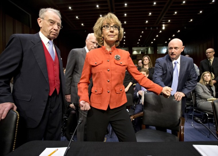 Former Arizona Rep. Gabrielle Giffords arrives on Capitol Hill in Washington, Wednesday, Jan. 30, 2013, for a hearing of the Senate Judiciary Committee hearing on gun violence.