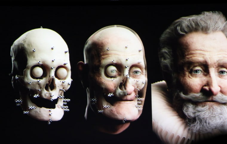 The skull of French King Henri IV and, at right, its reconstruction, appear on a screen during a press conference in Paris on Feb. 12.