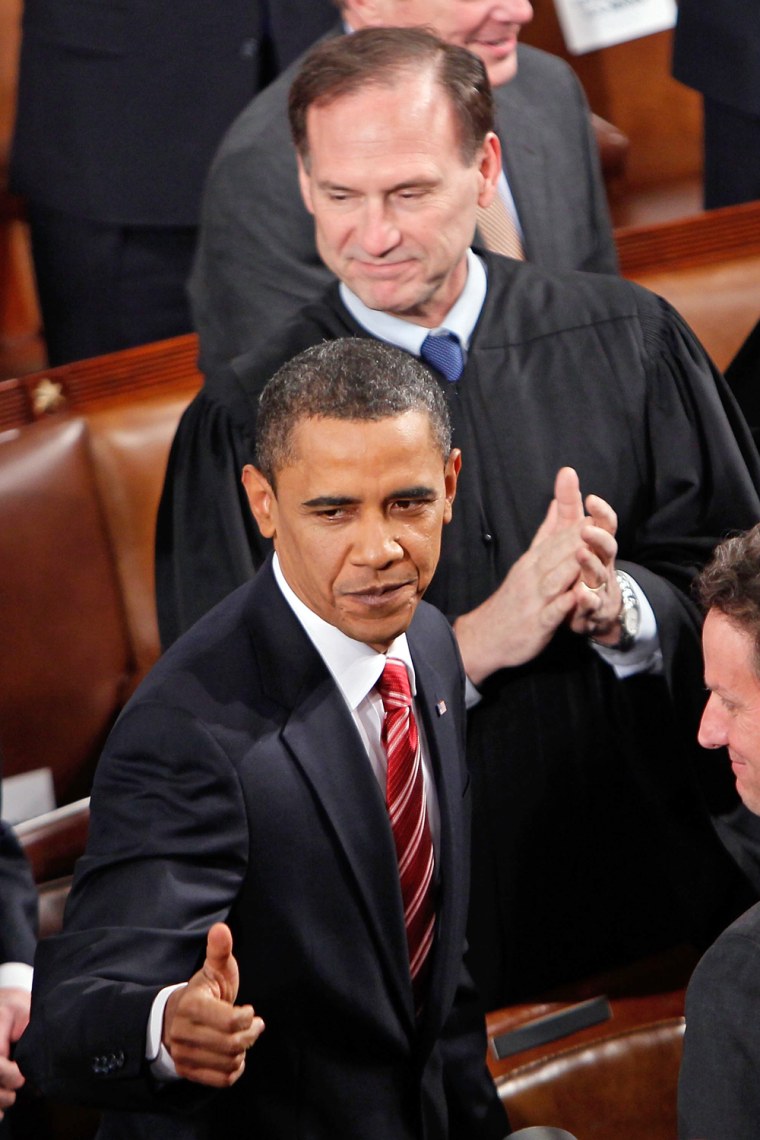 Supreme Court Justice Samuel Alito looks on as President Obama enters the chamber before his first State of the Union address in 2010.