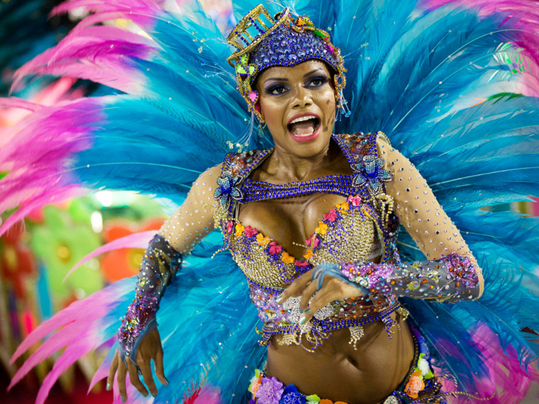 A performer from the Unidos de Vila Isabel samba school parades during Carnival celebrations at the Sambadrome in Rio de Janeiro, on Feb. 12.